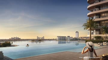 Stunning infinity pool at Seapoint Emaar Waterfront , overlooking serene ocean views