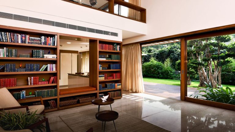 Total Environment - In That Quiet Earth Villa - Library leading to private garden