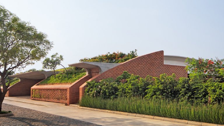 Total Environment - After the Rain - Lush greenery contrasts beautifully with the bricks facade