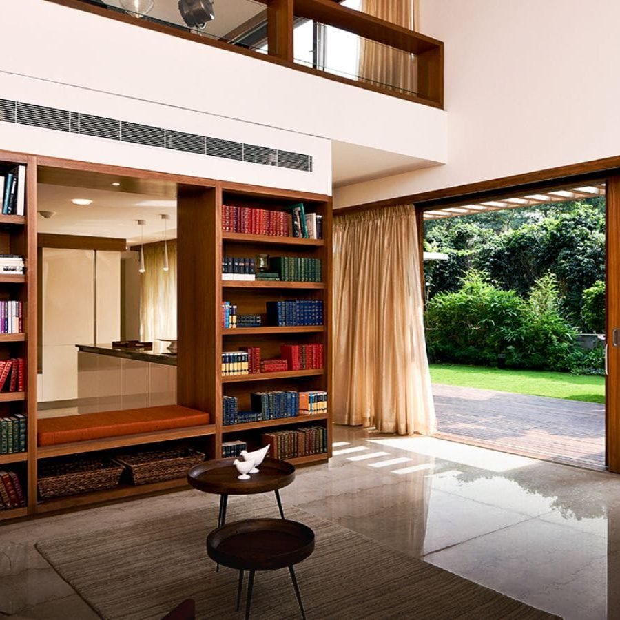 Total Environment - In That Quiet Earth Villa - Library leading to private garden